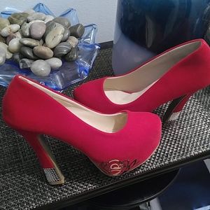 Red velvet platform pumps